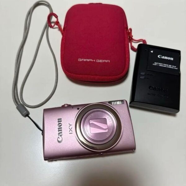 Beautiful condition Canon IXY in pink, including the body and accessories.