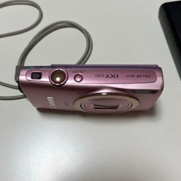 Beautiful condition Canon IXY in pink, including the body and accessories. - Image 4